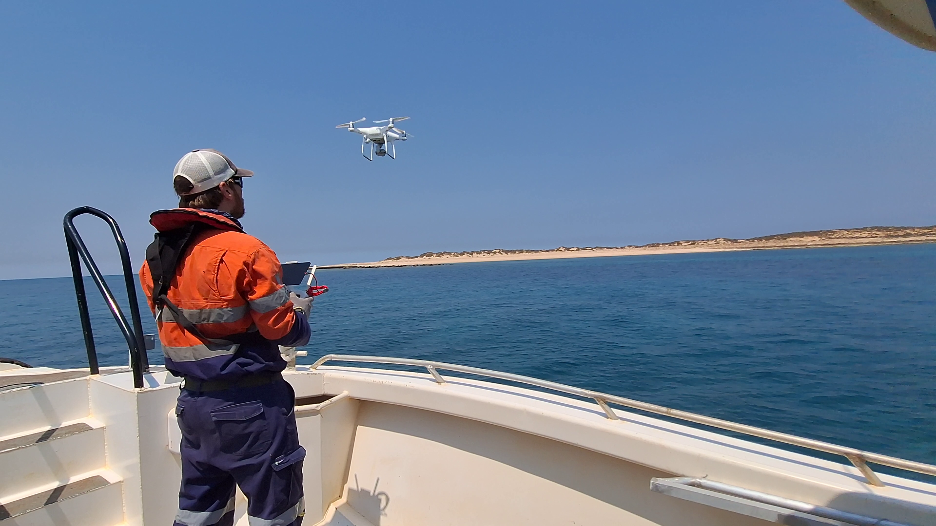 Dr Paul Whittock from Pendoley Environmental operating a drone during the marine turtle survey